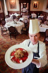Crathorne Hall Hotel chef Phillip Pomfret standing in one of the many dining rooms
