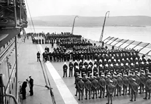 00091 Prints: The crew of the British Royal Navy Aircraft Carrier HMS Courageous parade on the flight