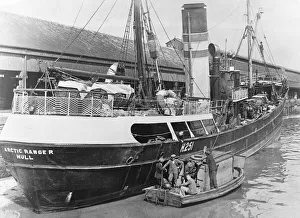 Trawler Prints: The crew of a diving boat chat with a crew member of the Boyd Line Ltd sidewinder trawler