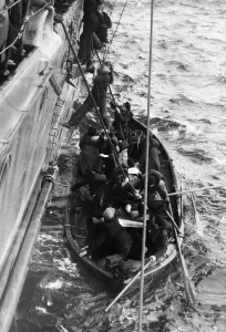 Crew of the German merchant ship Arucas are rescued by a British warship. 3rd March 1940