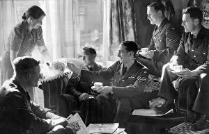 00206 Collection: Crew and officers of the RAF enjoying a cup of tea from their host in Blackpool during