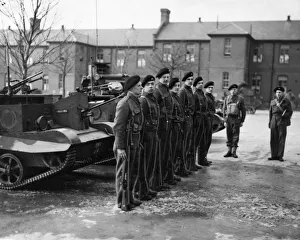 Crews of the Bren Gun Carriers do a little musketry drill during their training somewhere