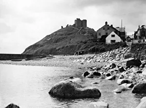 Rocks Prints: Criccieth Castle, situated on the headland between two beaches in Criccieth, Gwynedd