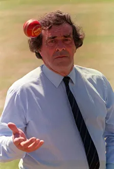 00190 Prints: Cricketer Fred Truman in Sunday People studio July 1990 with cricket ball