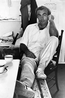 Cricketer John Edrich nurses his injured leg after batting in today