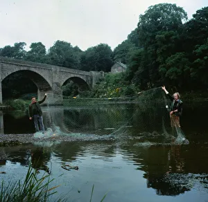 Crime Poaching August 1981 salmon bailiffs on bank of River Tweed holding nets
