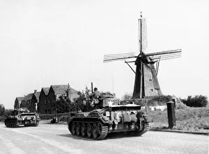 Cromwell tanks of Guards Armoured Division drive along Hells Highway