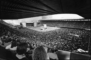 The crowd enjoy rock group Simple Minds in concert at The National Stadium