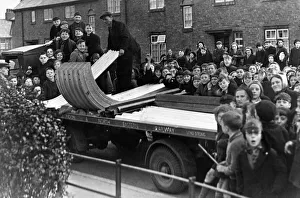 Wartime Prints: A crowd of excited youngsters watched the delivery of the first consignment of A. R. P