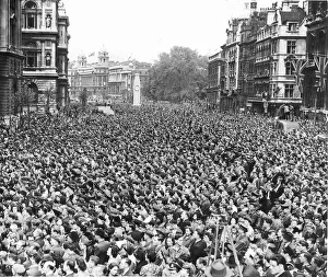 Crowd gathers in Whitehall London to celebrate the end of WW2 in Europe VE Day 8th