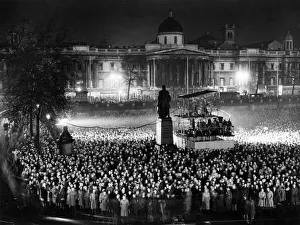 Illuminated Prints: Crowd scenes in Traflagar Square as they await the outcome of the General Election