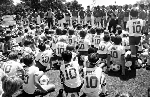 Crowd of young fans wearing Pele T Shirts at his soccer school in the USA August