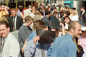 Crowds in Liverpool city centre watching the solar eclipse