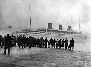 Wind Prints: Crowds of people bid farewell to the Ship Monarch of Bermuda now named Arkadia before her