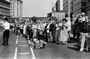Crowds of people line the dock road set for a day out at Liverpool Albert Dock to see