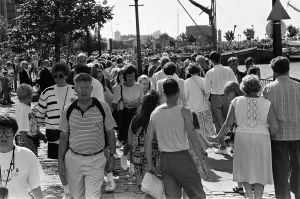 Crowds of people line the dock road set for a day out at Liverpool Albert Dock to see