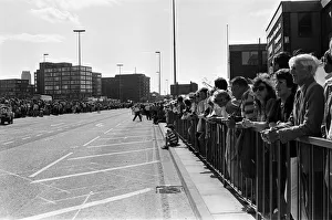 Crowds of people line the dock road set for a day out at Liverpool Albert Dock to see