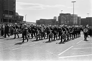 Crowds of people line the dock road set for a day out at Liverpool Albert Dock to see