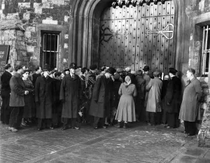 Prison Prints: Crowds pushing forward to read the notice of execution on the gate of Holloway Prison