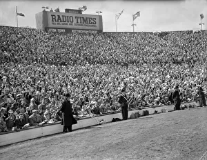 Crowds scenes during match action from the 1959 FA Cup Final at Wembley Stadium