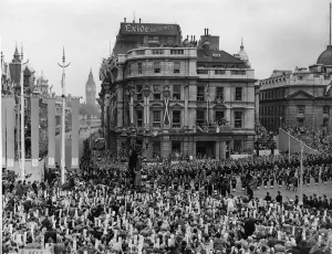 Big Ben Prints: Crowds in Trafalgar Square watch the military procession march past as they make their