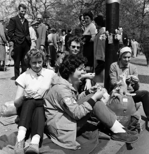 Crowds waiting for the wedding the following day of Princess Margaret
