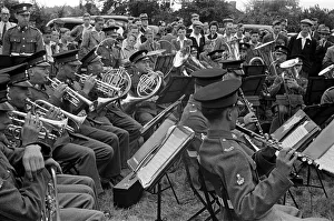 Crowds watching a military band playing during Canterbury Week, Kent, August 1947
