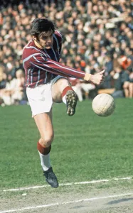 Crystal Palace footballer Bobby Tambling lets fly with a shot on goal during the league