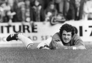 Crystal Palace goalkeeper John Burridge indulges in some amusing acrobatics before a