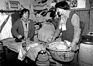Crystal Palace laundry ladies prepare the shirts before a game against Manchester United