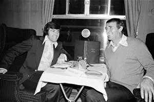 Crystal Palace manager Malcolm Allison meets Terry Venables on the train as they travel