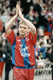 Clapping Prints: Crystal Palace midfielder Geoff Thomas applauds the supporters after his side