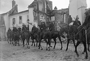 The Cuirassiers of the French cavarly seen here passing through the ruins of Senlis a