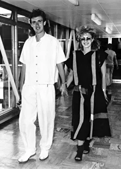 Culture Club lead guitarist Roy Hay leaves Heathrow with his wife Allison Hay