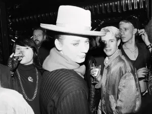 Culture Club singer Boy George attending a reception with Radio One DJ Janet Long