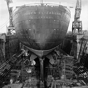 Repairs Prints: The Cunard Liner Queen Elizabeth in dry dock in Southampton for her yearly overhaul