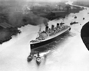 River Prints: The Cunard White Star Liner the RMS Queen Mary makes her way down the River Clyde to