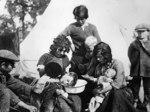 Gypsy Prints: Curing earache in gipsy fashion. It is their belief that water poured from a kettle into