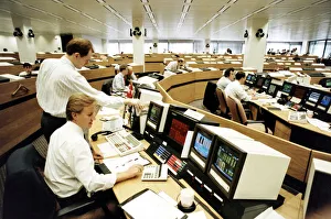 Money Prints: A currency dealer studies a computer screen at the Natwest Bank trading floor in London