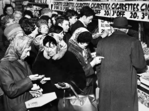 Headscarf Prints: Customers crowding round a cigarette counter in the Co-op in London Road, Liverpool