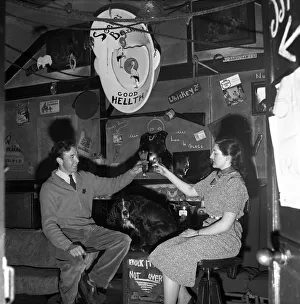 The customers of the Old Turkey Cock pub near Hunston in Herts. 1956 A273-001