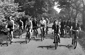 00078 Prints: Cyclists out for a spin along a country lane near Belsay in Northumberland in 1950