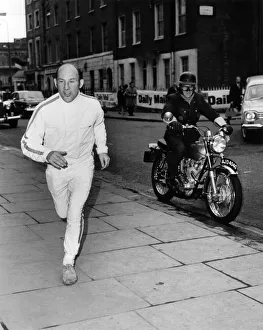 Daily Mail Transatlantic Air Race Racing driver Stirling Moss sprints across
