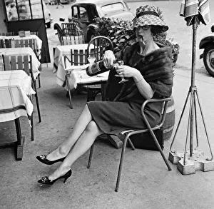 Street Scenes Prints: Daily Mirror agony aunt Marjorie Proops sitting at a cafe in Paris