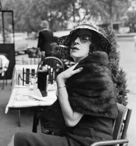 01071 Prints: Daily Mirror agony aunt Marjorie Proops sitting at a cafe in Paris