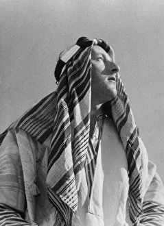 00964 Prints: Daily Mirror cameraman George Greenwell seen here in Arab dress during his photographic