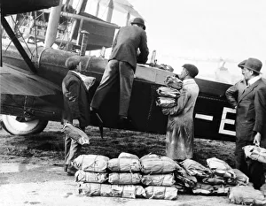 Daily Mirror newspaper being loaded onto a Vickers 100 aircraft for delivery to