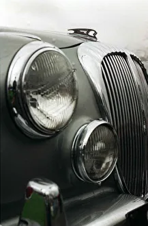Daimler Prints: DAIMLER V8 KENNETH MCFADDEN February 1998 Detail of grille headlamp fog