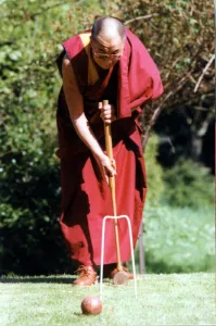 Dalai Lama Prints: The Dalai Lama, the Tibetan spirtual leader pictured playing croquet at the Egerton Grey