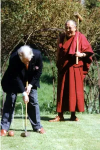Robe Prints: The Dalai Lama, the Tibetan spirtual leader playing croquet at the Egerton Grey Hotel